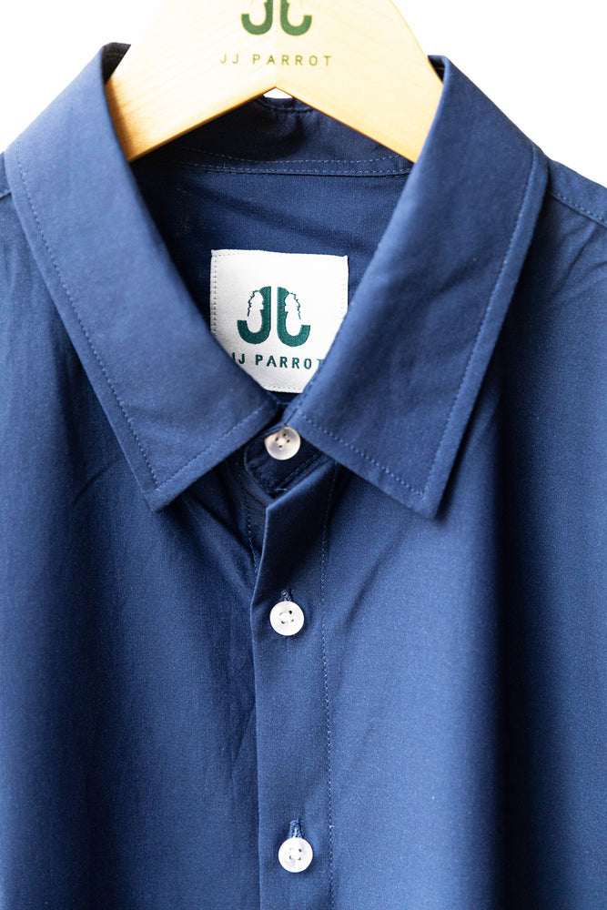 
                  
                    Solid Navy Short Sleeve Button Down
                  
                